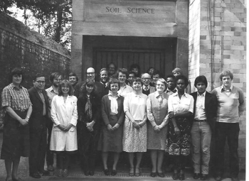 Picture caption: Peter Nye with members of the Oxford Soil Science Laboratory circa 1983. Nye is sixth from the left. To his left are Bob White, Philip Beckett, Ros Haigh, Guy Kirk, Rachhpal Singh, James McDuff, X, Frank Greene, Pete Darrah, Robin Kneale, Gwyneth Jenkins, Andrew Ameloko, X, X, Raul Ponce-Hernandez, Mike Hedley. Far left is Hilary Moorby and in front of Nye is Jeni Tree. Missing is Siobhan Staunton.